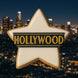 3.5 inch Star Metal Cookie Cutter shaped cookie with 'HOLLYWOOD' decoration against a night city skyline backdrop.
