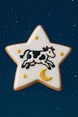 3 inch Star Metal Cookie Cutter creating a star-shaped cookie with a cow design on a blue background.
