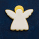 Angel-shaped cookie with white body and wings on a dark blue background from a 3 inch Angel Metal Cookie Cutter