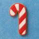 Candy cane-shaped cookie on a blue background from a 3.5 inch Candy Cane Metal Cookie Cutter