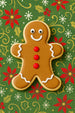 3.5 inch Folk Gingerbread Boy Metal Cookie Cutter shaped cookie decorated with icing on holiday pattern backdrop.