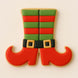 Decorative cookie shaped like a pair of elf shoes with green and red stripes on a beige background from a 3.5 inch Elf Legs Metal Cookie Cutter