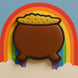 Cookie shaped like a pot of gold with a rainbow in the background from a 3.5 inch Pot O Gold or Witch's Cauldron Metal Cookie Cutter