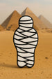 Mummy-shaped cookie with pyramids in the background from a 5 inch Mummy Metal Cookie Cutter