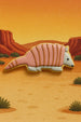 5 inch Armadillo Metal Cookie Cutter shaped pink cookie on desert background.