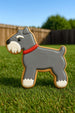 4.75 inch Schnauzer Metal Cookie Cutter shaped cookie with gray icing and red collar on grass.