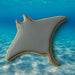 4.5 inch Manta Ray Metal Cookie Cutter shaped cookie on an ocean background.