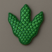 Green dinosaur scale-shaped cookie on a gray background from a 4 inch Dinosaur Foot Print Metal Cookie Cutter