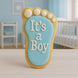 Cookie shaped like a baby footprint with 'It's a Boy' text in a nursery setting from a 3.5 inch Right Foot Metal Cookie Cutter