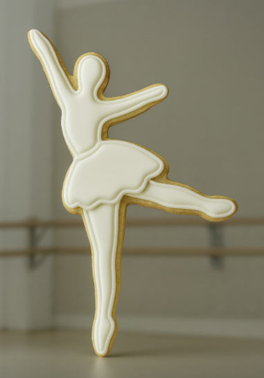 Decorative cookie shaped like a ballerina in a dance studio from a 4.5 inch Ballerina Metal Cookie Cutter