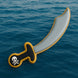 Pirate sword with skull and crossbones design on a blue ocean background from a 5.5 inch Pirate's Sword Metal Cookie Cutter