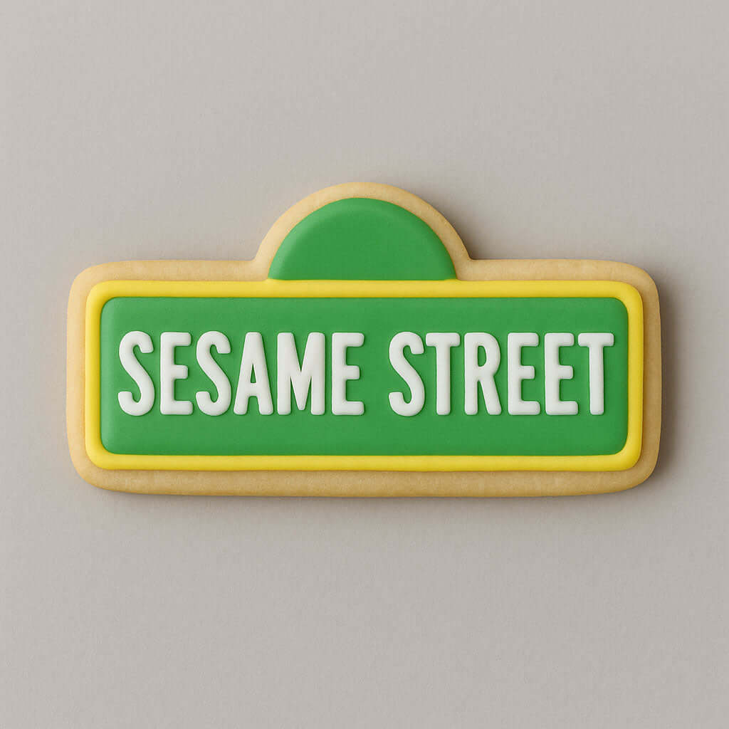 Cookie shaped like a Sesame Street sign with green background and white text on a gray background from a 5 inch Street Sign Metal Cookie Cutter