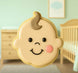 Cookie shaped like a baby's face in a nursery setting from a 4.25 inch Baby Face Metal Cookie Cutter