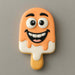 Cookie shaped like a popsicle with a smiling face on a gray background from a 4.5 inch Popsicle Metal Cookie Cutter
