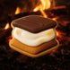 S'mores cookie with marshmallow and chocolate against a campfire background from a 3.5 inch S'more Metal Cookie Cutter