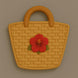 Decorative woven basket with a red flower on a beige background from a 3.25 inch Beach Bag Metal Cookie Cutter