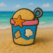 Toy bucket with starfish, shell, and sand on a beach from a 3.5 inch Beach Bucket Pail with Shovel Metal Cookie Cutter