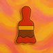 Paintbrush-shaped object on a swirling orange and pink background from a 4 inch Paint Brush Metal Cookie Cutter