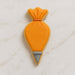 Piping bag cookie with orange body and gray base on a light marble background from a 4 inch Piping Bag Metal Cookie Cutter