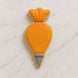 Piping bag cookie with orange body and gray base on a light marble background from a 4 inch Piping Bag Metal Cookie Cutter