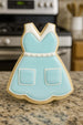 Decorative cookie shaped like a apron on a kitchen counter from a 3.5 inch Cheerleader Uniform Metal Cookie Cutter