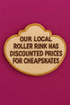 4.5 inch Plaque Metal Cookie Cutter shaped cookie with text about discounted prices at a roller rink.