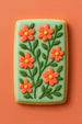 Decorative cookie with floral design on a solid background from a 5 inch X 3 inch Rectangle Biscuit Metal Cookie Cutter