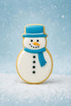 Decorative snowman cookie with blue hat and scarf on a snowy background for a 4 inch Snowman Metal Cookie Cutter