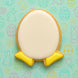Easter-themed cookie with yellow base and white top on a patterned background from a 3.25 inch Egg with Feet Humpty Dumpty Metal Cookie Cutter