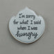 Cookie with text 'I'm sorry for what I said when I was hungry' on a gray background from a 4.75 inch Plaque or Frame Metal Cookie Cutter