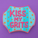 Cookie with 'KISS MY GRITS' text on a purple background from a 4.75 inch Plaque or Frame Metal Cookie Cutter