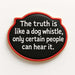 4.5 inch Plaque Metal Cookie Cutter with black background and white text: 'The truth is like a dog whistle, only certain people can hear it.'