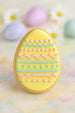 Decorative Easter egg cookie with pastel colors on a soft focus background from a 1.75 inch Mini Easter Egg Metal Cookie Cutter