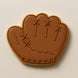 Brown leather baseball glove cookie on a beige background from a 1.75 inch Mini Baseball Glove Metal Cookie Cutter