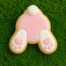 Decorative cookie shaped like a rabbit on grass from a 2 inch Mini Bunny Butt Metal Cookie Cutter