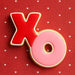 Red and pink letter  cookies on a red background with white hearts 2 inch Mini Hugs and Kisses Metal Cookie Cutter