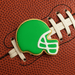 Green and gold football helmet cookie on a brown football for 2 inch Mini Football Helmet Metal Cookie Cutter