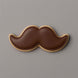 Cookie shaped like a mustache on a gray background from a 2 inch Mini Mustache Metal Cookie Cutter