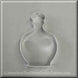 4.25 inch Perfume Potion or Genie Bottle Metal Cookie Cutter on a gray background.