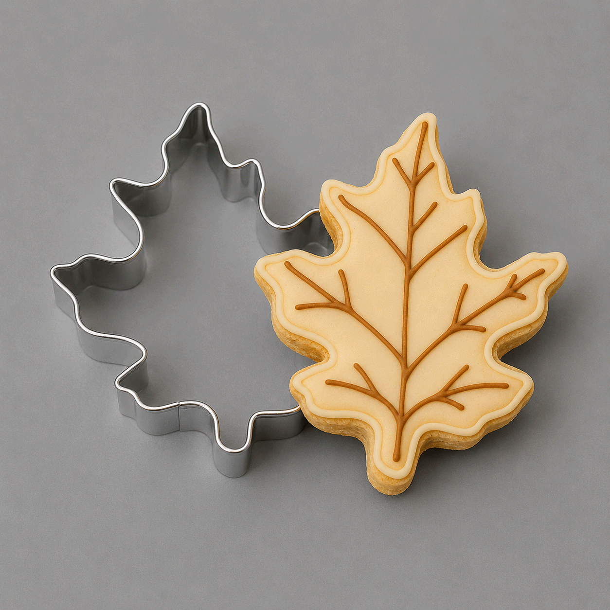 Both a cutter and cookie from a 3.5 inch Oak Leaf Metal Cookie Cutter