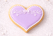 Heart-shaped cookie with purple icing and white decorations on a light background from a 1.75 inch Mini Heart Metal Cookie Cutter