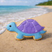 Tortoise-shaped cookie on a sandy beach with ocean in the background from a 4.75 inch Turtle Metal Cookie Cutter