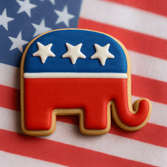 Cookie shaped like a red and blue elephant with white stars on an American flag background from a 3.25 inch Elephant Metal Cookie Cutter