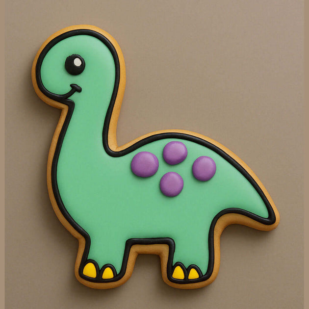 Brontosaurus-shaped cookie with green body, purple spots, and yellow feet on a beige background from a 4 inch Brontosaurus Metal Cookie Cutter