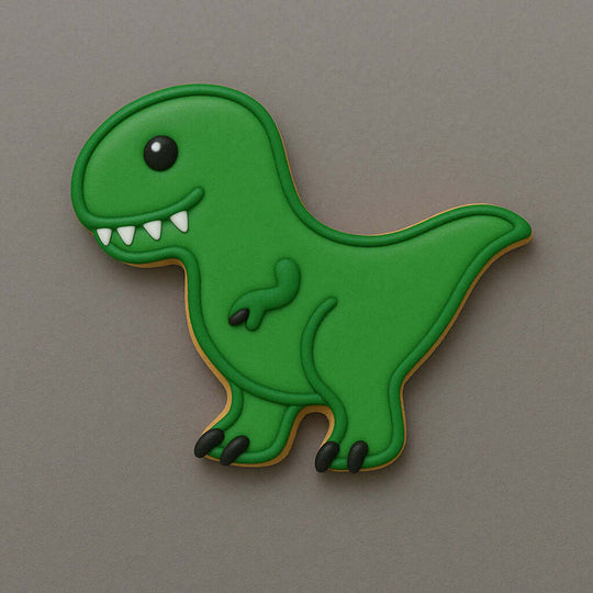 Green dinosaur-shaped cookie on a gray background from a 4 inch Tyrannosaurus T Rex Metal Cookie Cutter