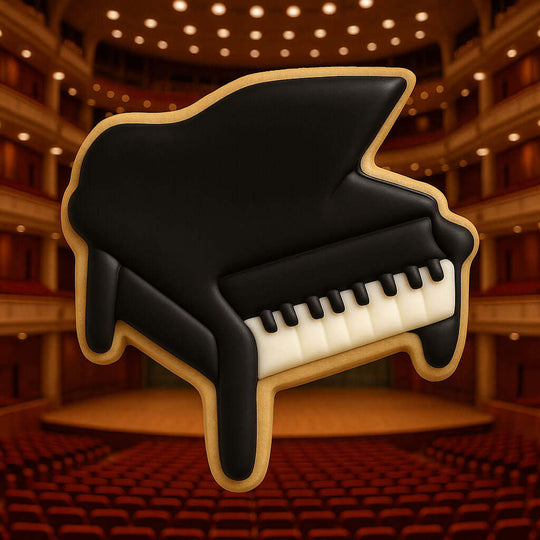Cookie shaped like a grand piano in an auditorium setting from a 3.5 inch Baby Grand Piano Metal Cookie Cutter