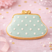 Cookie shaped like a handbag with polka dot pattern on a pink background from a 4 inch Purse Metal Cookie Cutter