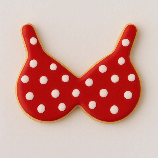 Red polka dot cookie shaped like a bikini top on a white background from a4 inch Bikini Top Bra Metal Cookie Cutter