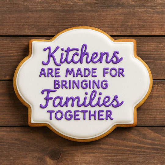 4.5 inch Plaque Metal Cookie Cutter shaped cookie with purple icing text showing "Kitchens Are Made For Bringing Families Together".