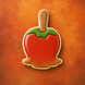 Red candle apple cookie with a wooden stem on an orange background from a 4 inch Candy Carmel Apple Metal Cookie Cutter